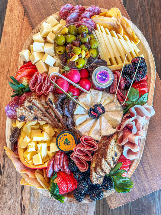Medium Charcuterie board Rachel@yummscharcuterie.com