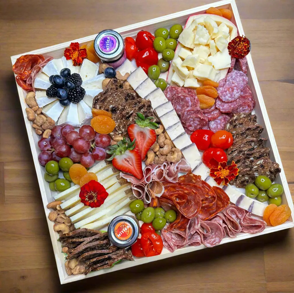 Medium Charcuterie board Rachel@yummscharcuterie.com